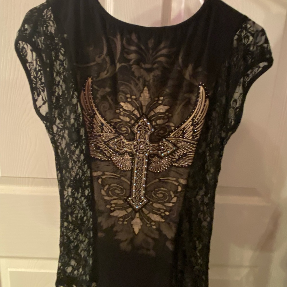 Black with lace sleeves and lace on the back